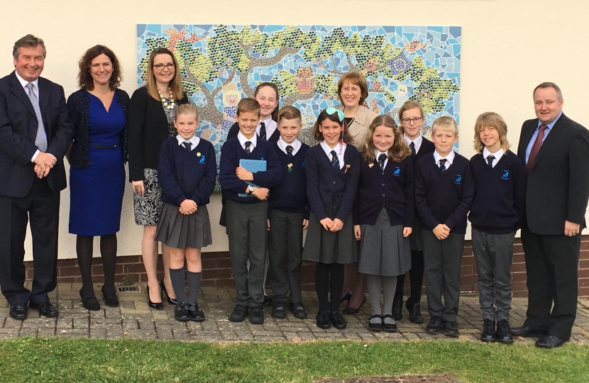 Clwyd West Assembly Member Darren Millar with the Welsh Cabinet Secretary for Education Kirsty Williams,  Headteacher John MacLennan and  pupils and staff. 