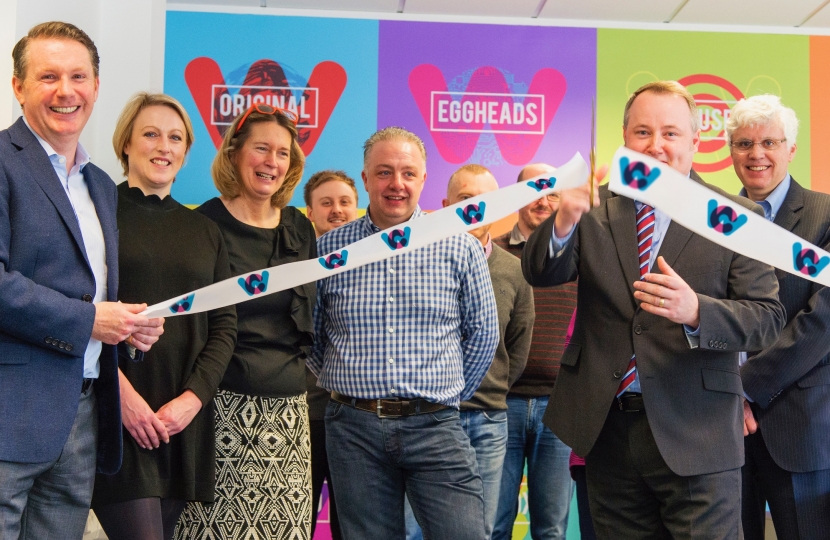 Clwyd West AM Darren Millar cuts the ribbon at the official opening of Worldspan’s new offices on Abergele Business Park.  