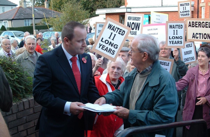 Darren Millar AM receiving a petition in Abergele